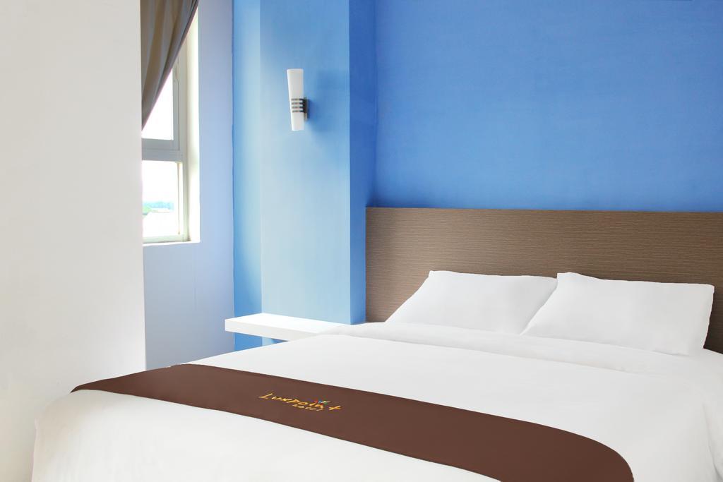 Luxpoint Hotel Baratajaya Surabaja Pokoj fotografie